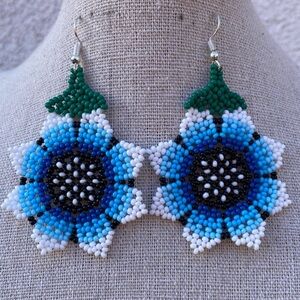 Handmade chakira bead sunflower earrings. Huichol art by artisans in Mexico